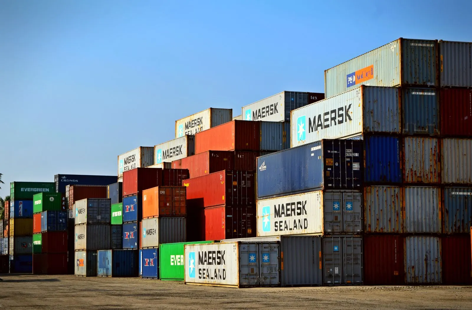 Shipping containers stacked at a port